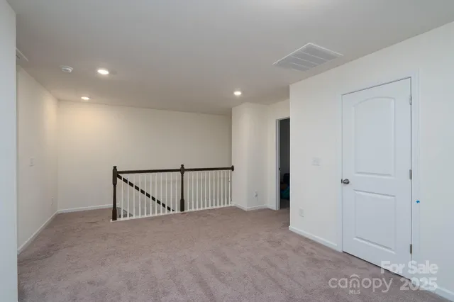 a view of hallway with a window