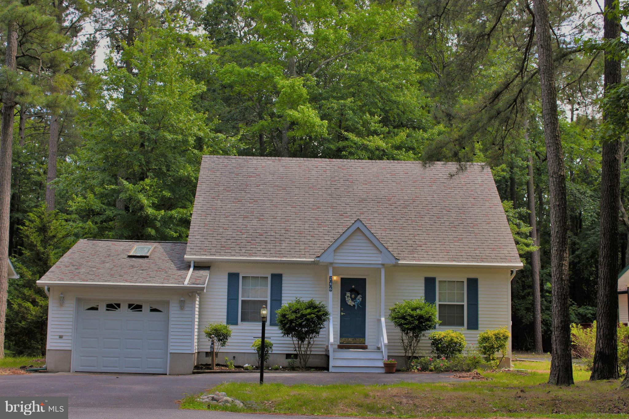 246 Windjammer Road Ocean Pines, MD 21811 - Photo 1 of 30 front view of a house with a yard