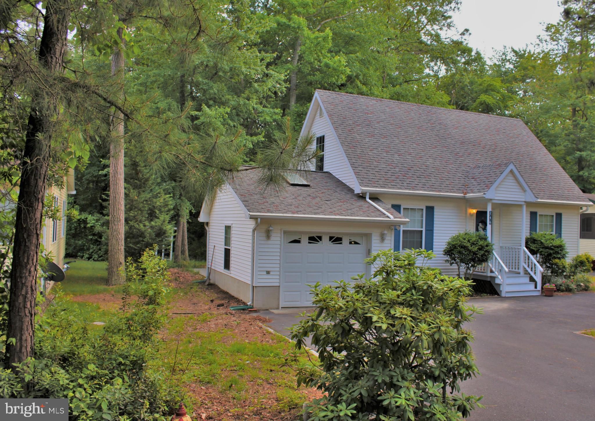 246 Windjammer Road Ocean Pines, MD 21811 - Photo 2 of 30 front view of a house with a yard