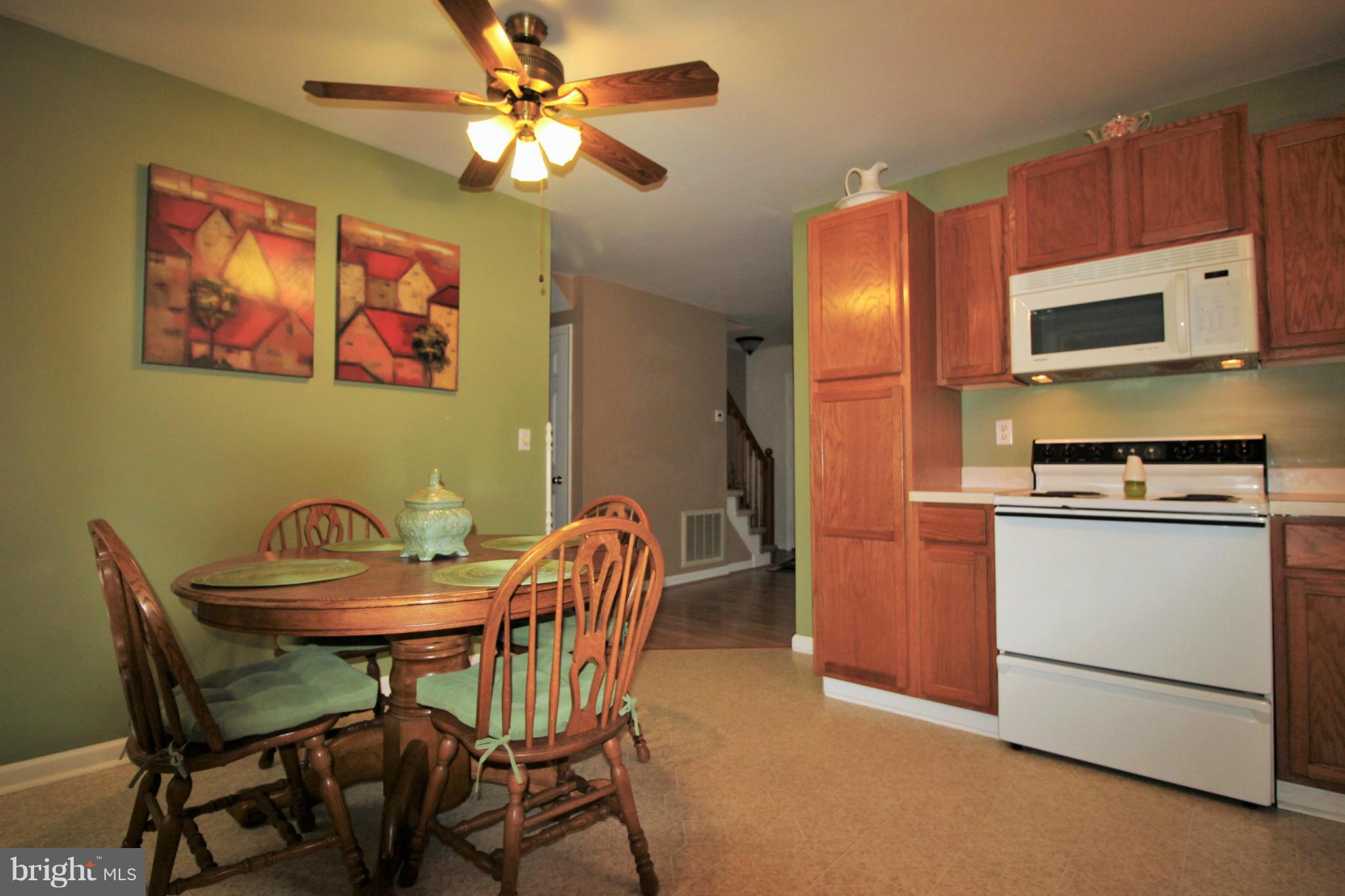 246 Windjammer Road Ocean Pines, MD 21811 - Photo 11 of 30 a view of a dining room with furniture