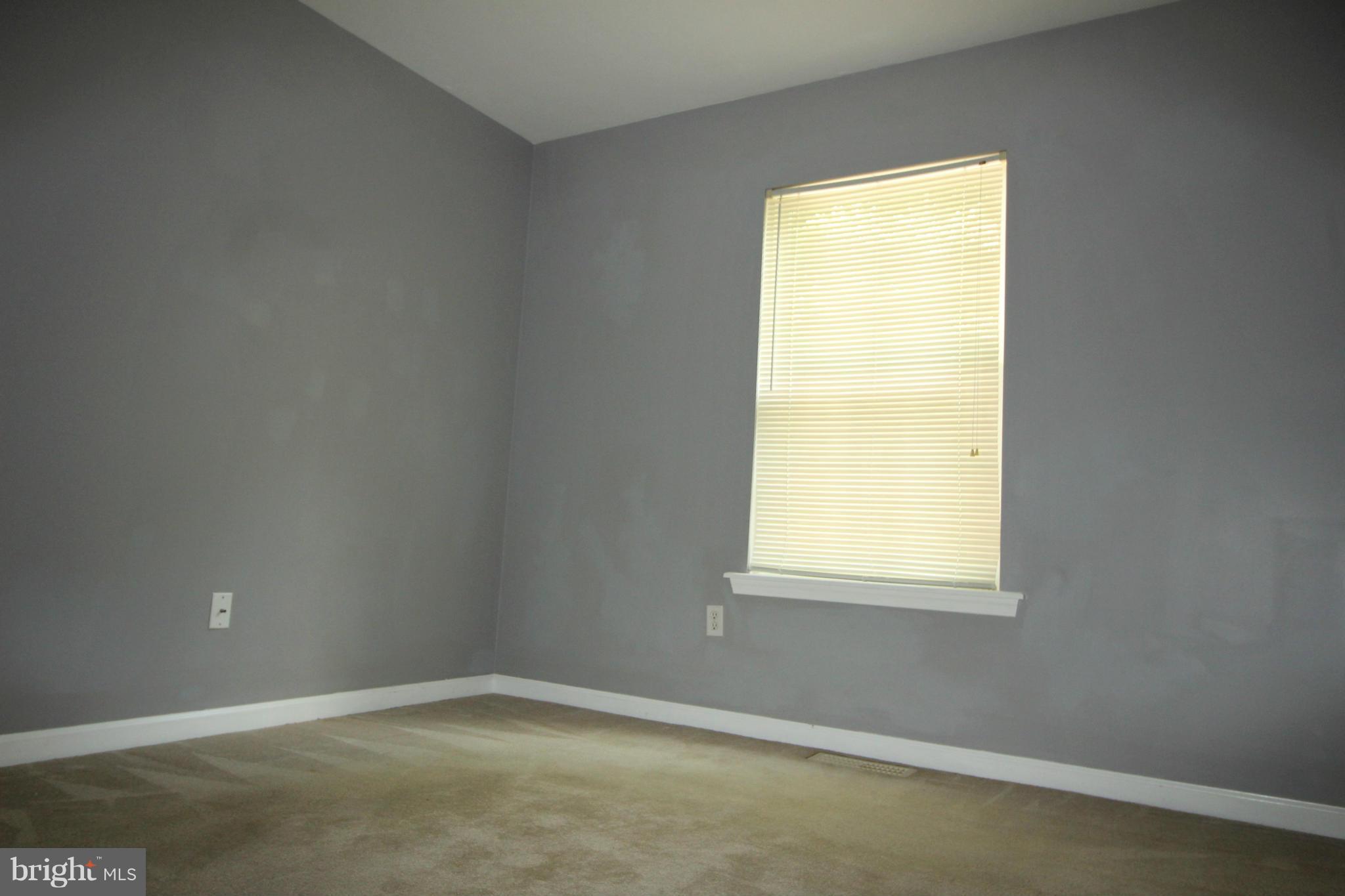 246 Windjammer Road Ocean Pines, MD 21811 - Photo 17 of 30 an empty room with a window
