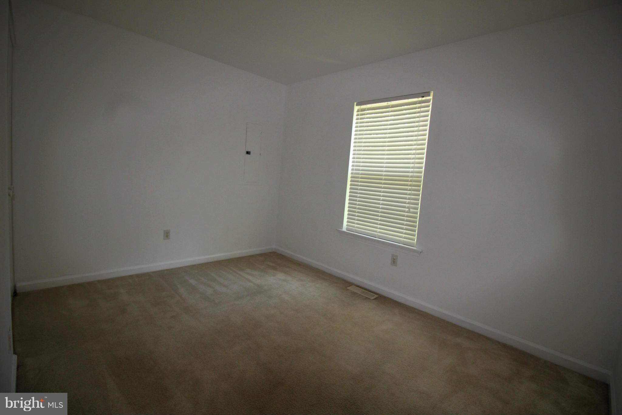 246 Windjammer Road Ocean Pines, MD 21811 - Photo 20 of 30 an empty room with a window