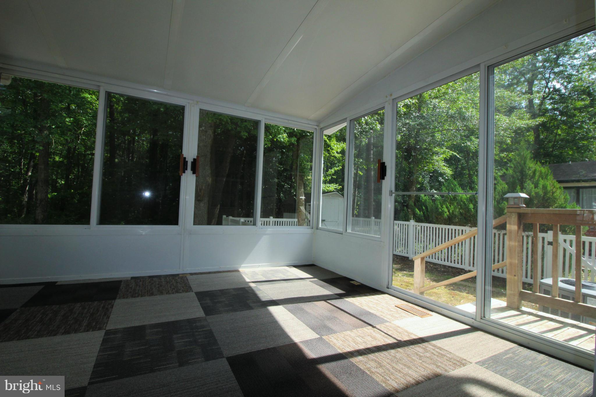 246 Windjammer Road Ocean Pines, MD 21811 - Photo 25 of 30 a view of a large window with an outdoor space