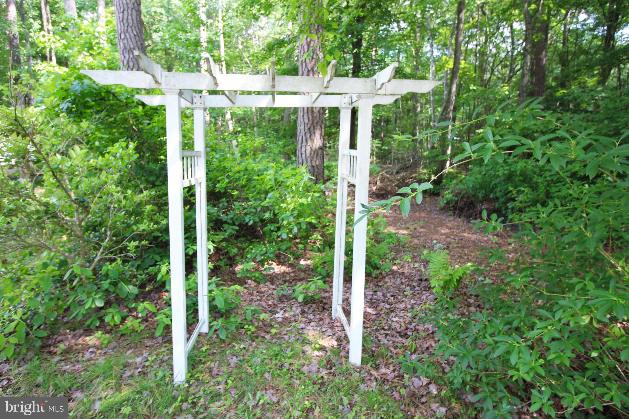 246 Windjammer Road Ocean Pines, MD 21811 - Photo 27 of 30 a view of outdoor space and garden