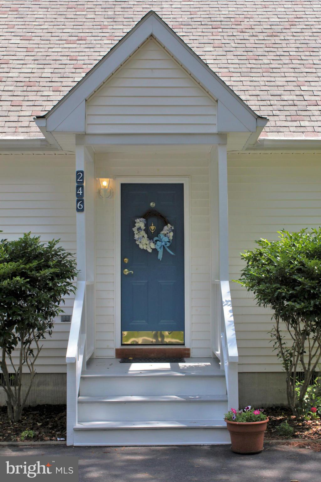 246 Windjammer Road Ocean Pines, MD 21811 - Photo 5 of 30 a front view of a house with street