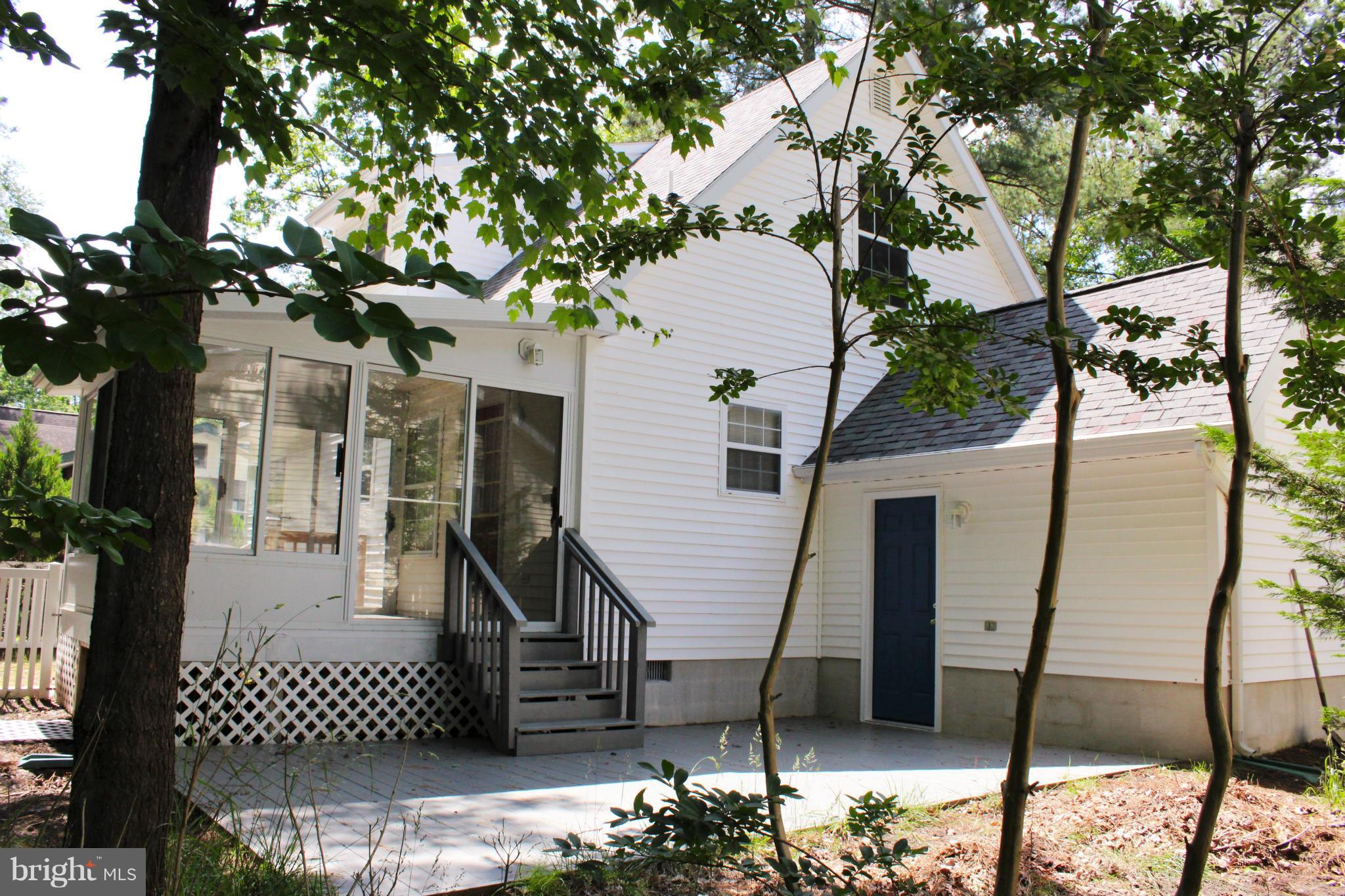 246 Windjammer Road Ocean Pines, MD 21811 - Photo 6 of 30 a view of a house with a tree