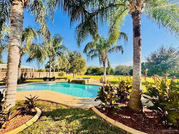 a view of an swimming pool and an outdoor space
