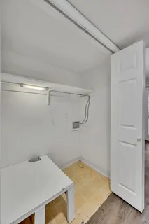 a view of a room with racks on the wall