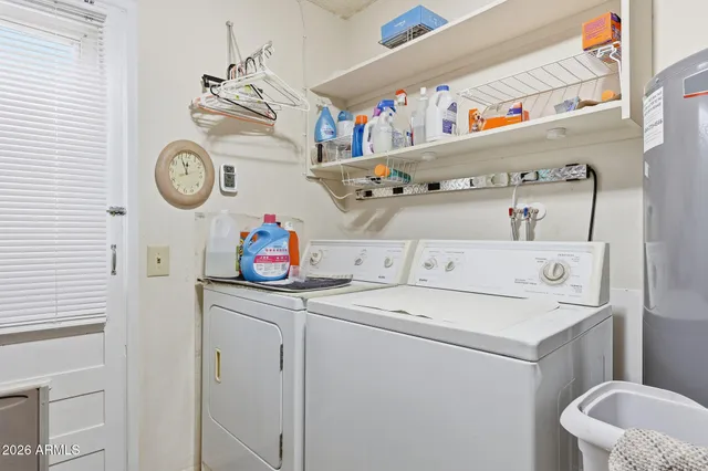 a utility room with dryer and washer