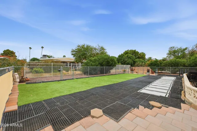 a view of a backyard with a garden