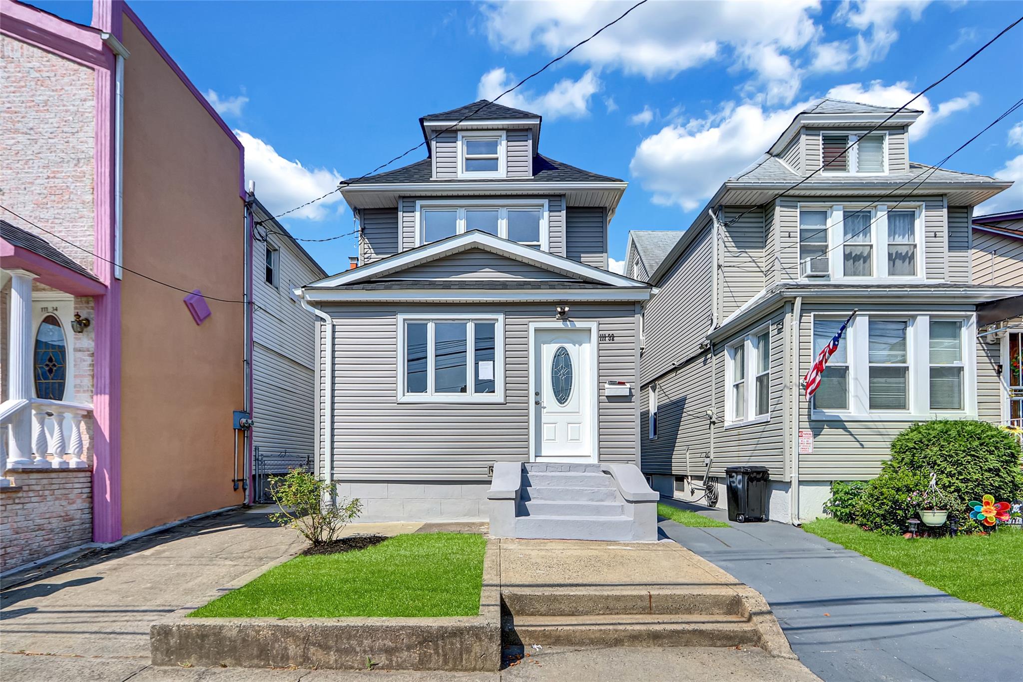 111-32 116th Street Queens, NY 11420 - Photo 1 of 18 a front view of a house with a yard