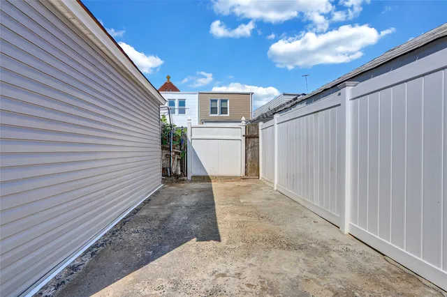 a view of a back yard of the house