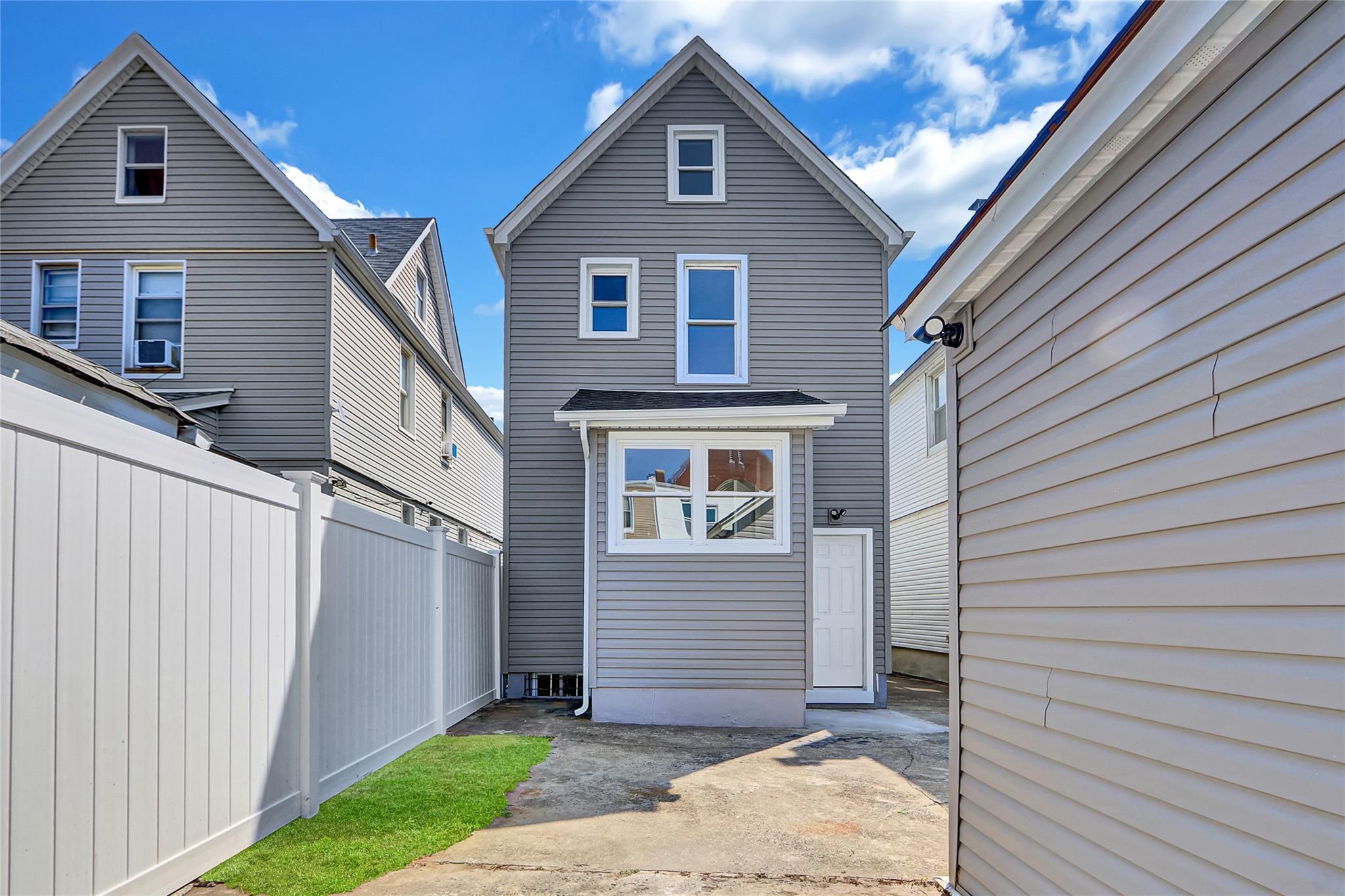 111-32 116th Street Queens, NY 11420 - Photo 18 of 18 a front view of a house with a yard