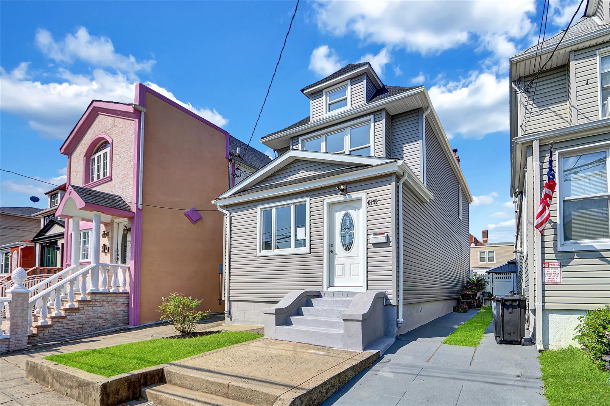 111-32 116th Street Queens, NY 11420 - Photo 2 of 18 a front view of a house with garden