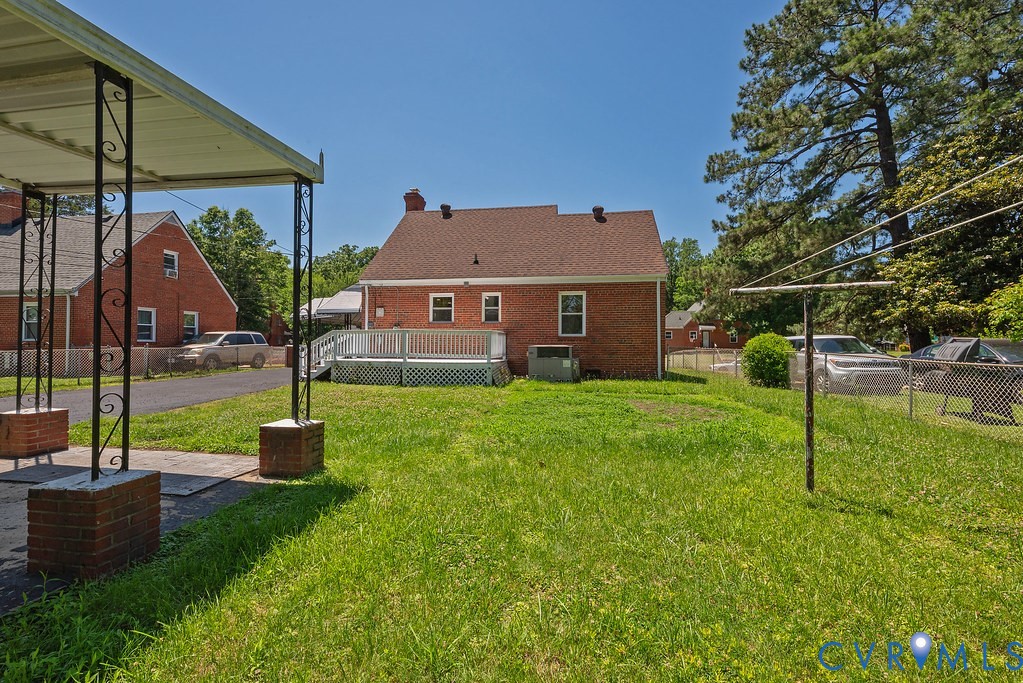 3400 Ryburn Road Richmond, VA 23234 - Photo 38 of 45 Expansive backyard featuring a brick exterior with
