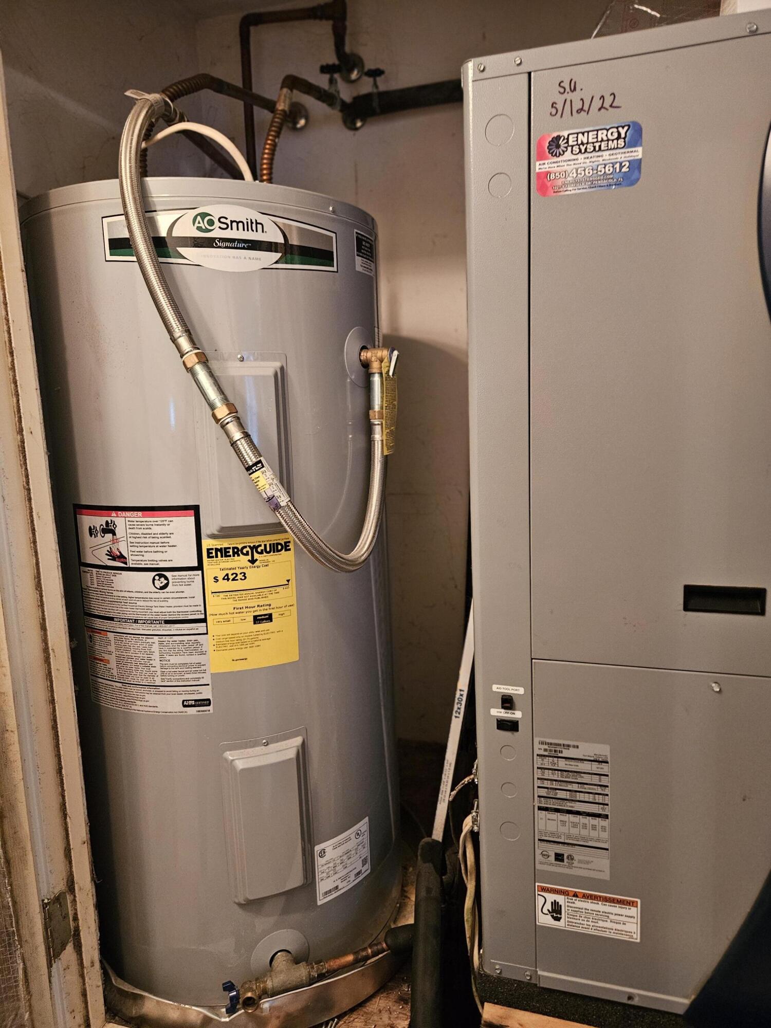 108 Mohawk Trail Crestview, FL 32536 - Photo 30 of 39 a view of storage and utility room with washer and dryer