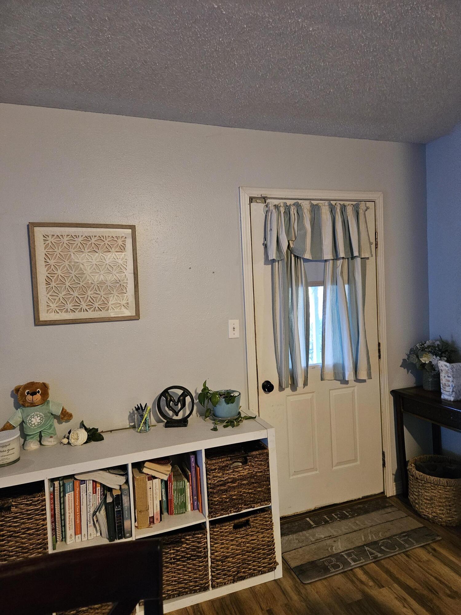 108 Mohawk Trail Crestview, FL 32536 - Photo 35 of 39 a view of wooden floor and dining room