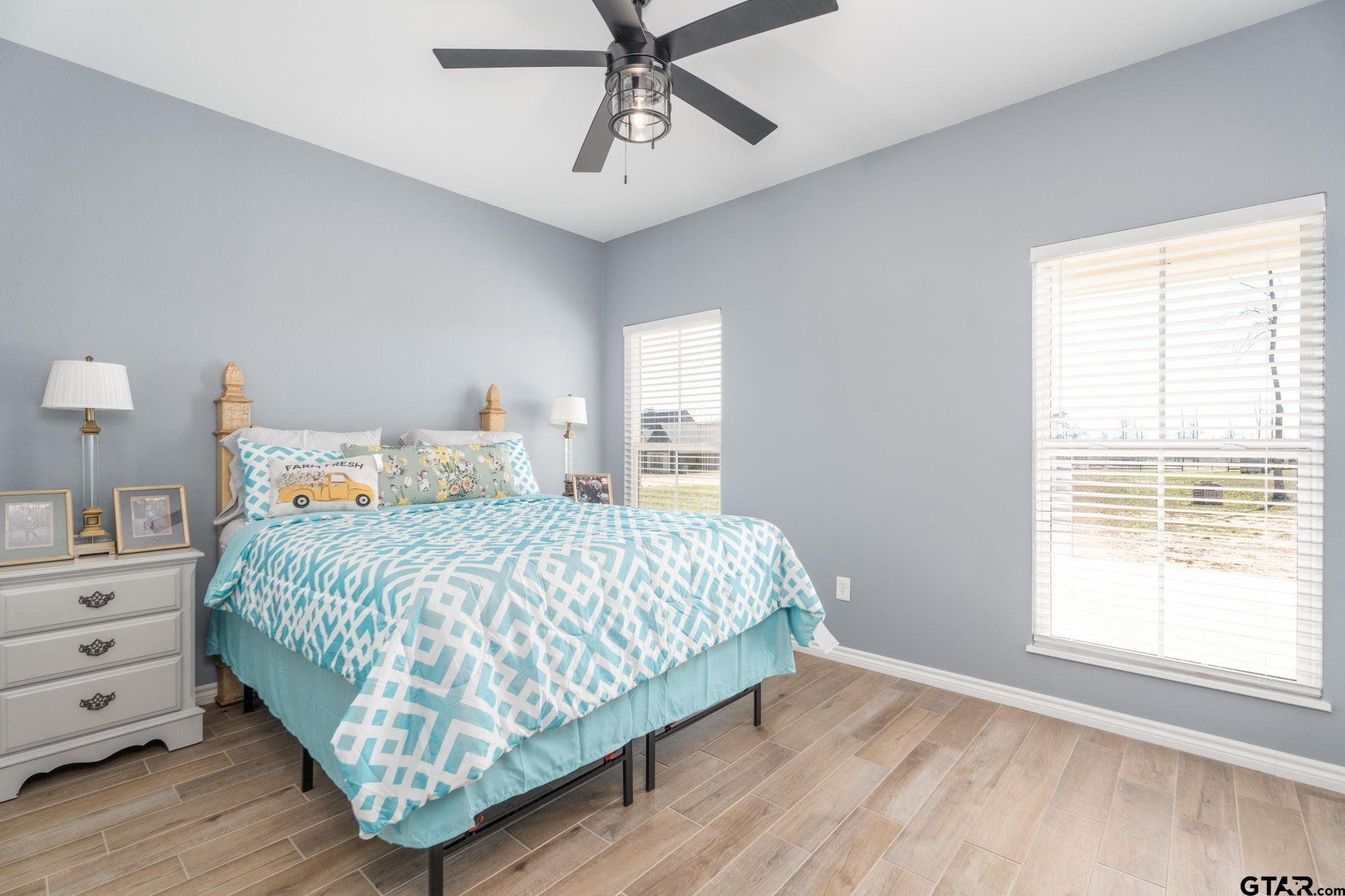 4356 Buie Road Diana, TX 75640 - Photo 18 of 29 a bedroom with a bed and window