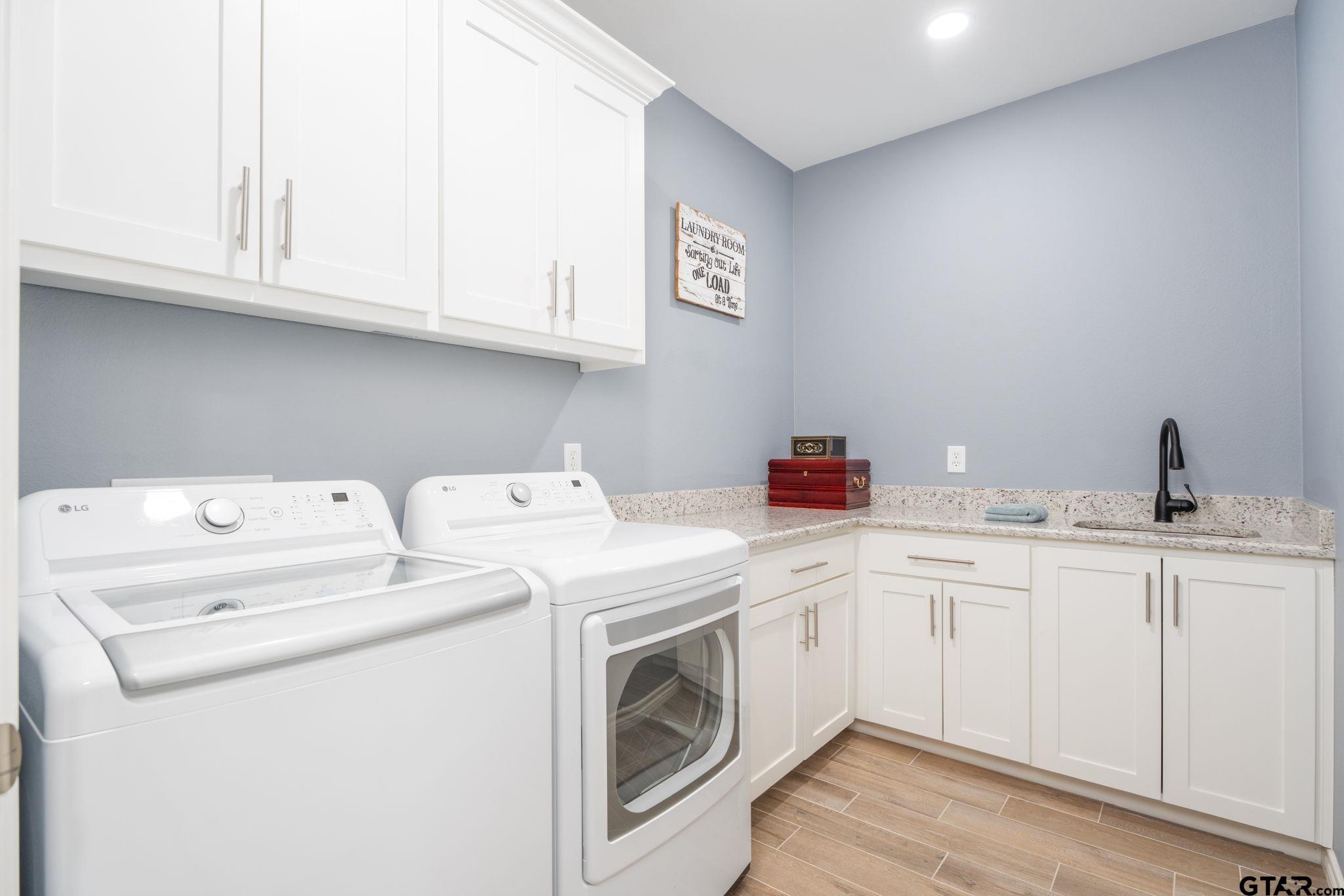 4356 Buie Road Diana, TX 75640 - Photo 20 of 29 a utility room with dryer and washer