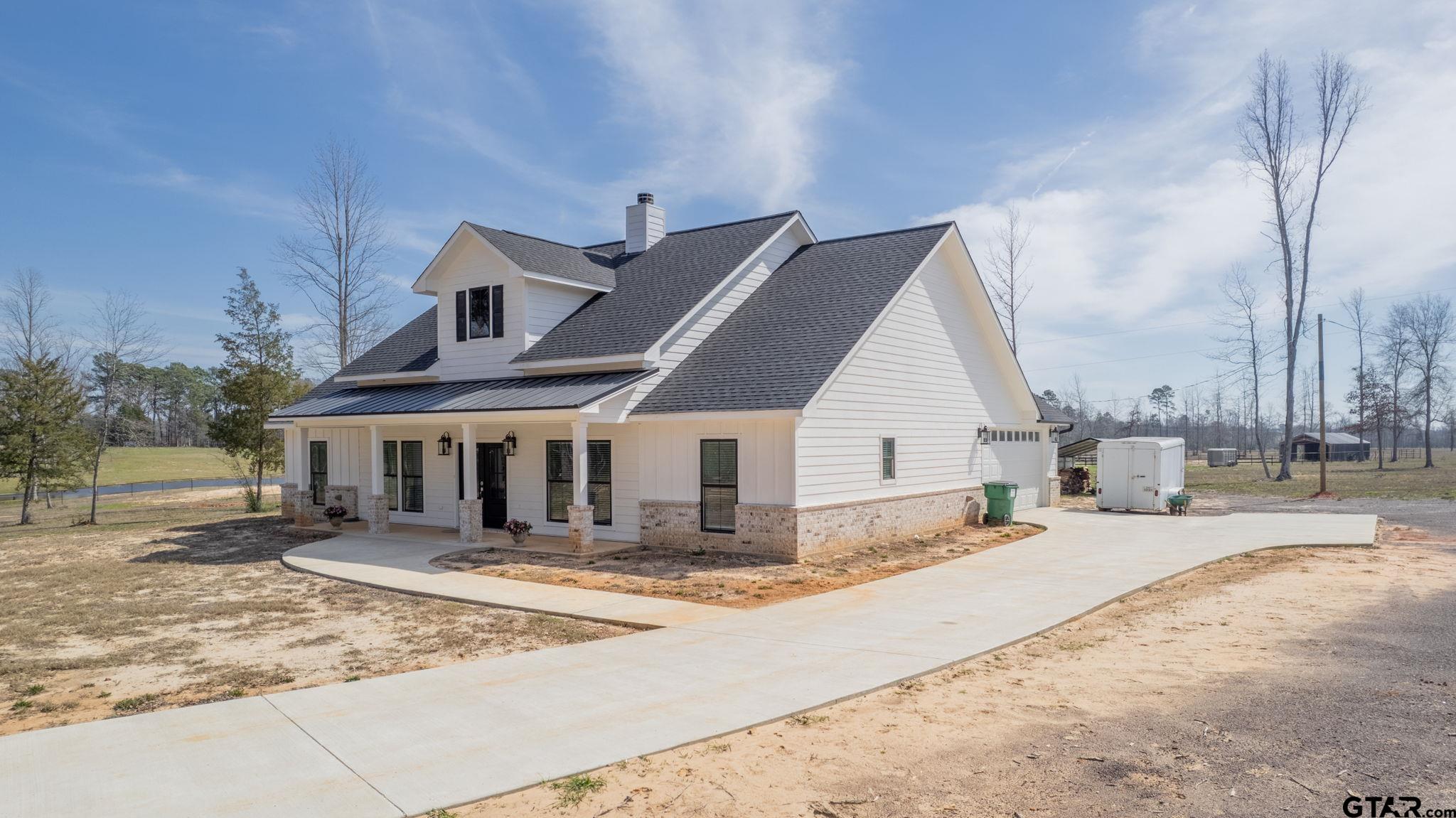 4356 Buie Road Diana, TX 75640 - Photo 21 of 29 a view of a house with snow on the wall