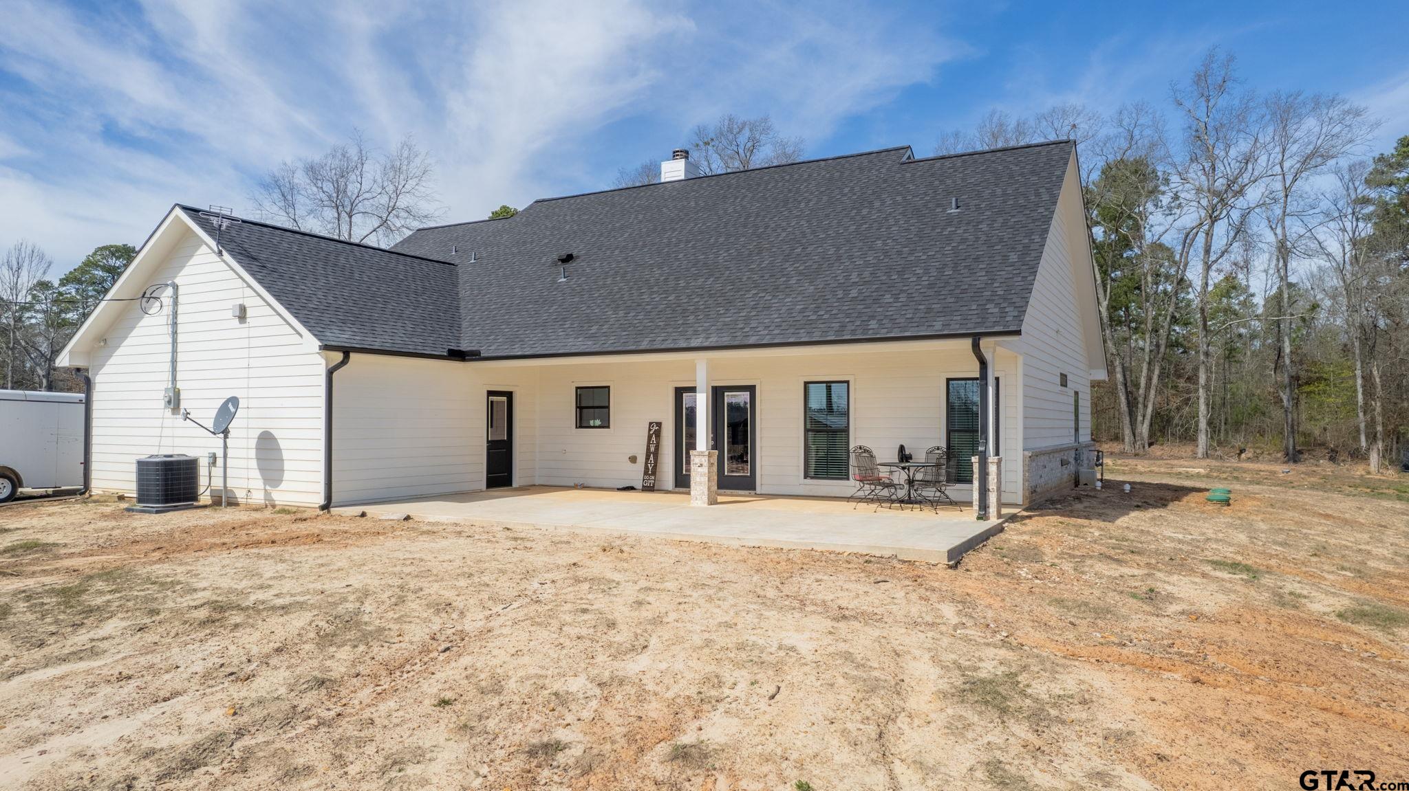 4356 Buie Road Diana, TX 75640 - Photo 23 of 29 a view of a house with a yard and covered with snow in front of house