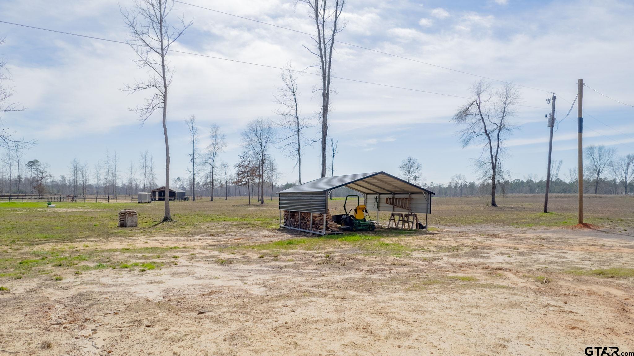 4356 Buie Road Diana, TX 75640 - Photo 24 of 29 a view of a garden with a slide