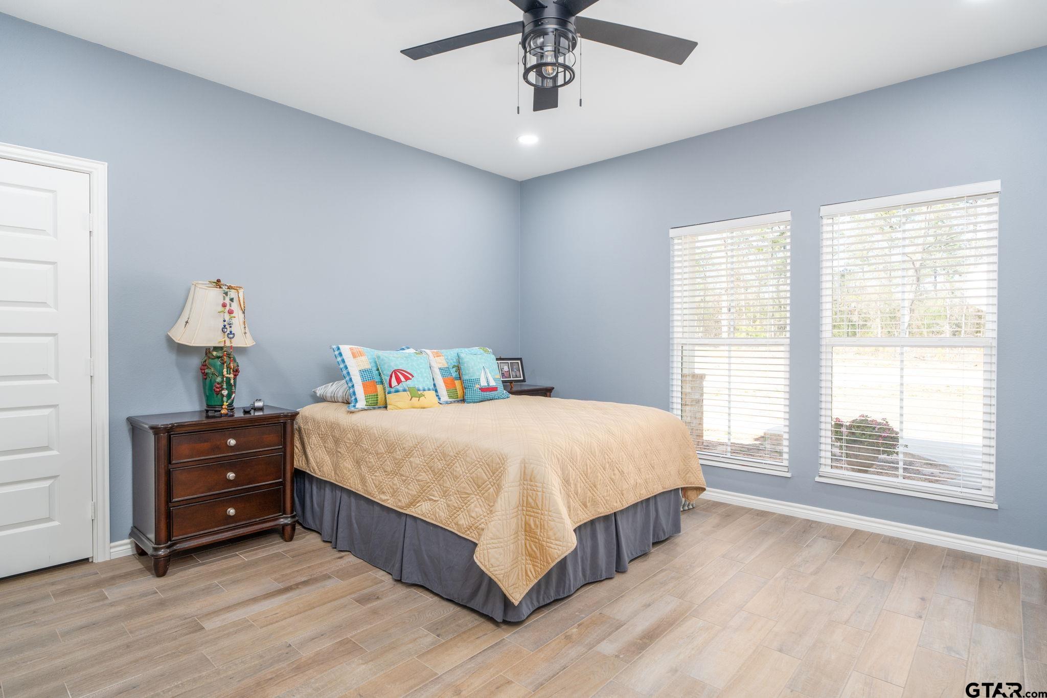 4356 Buie Road Diana, TX 75640 - Photo 10 of 29 a bedroom with a bed and window