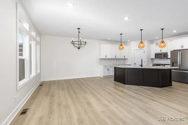 $539,900 | 6604 Timber Crst Drive Northeast, Unit 54, Rockford, MI 49341