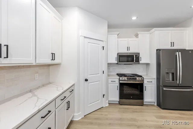 $539,900 | 6604 Timber Crst Drive Northeast, Unit 54, Rockford, MI 49341