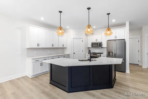 $539,900 | 6604 Timber Crst Drive Northeast, Unit 54, Rockford, MI 49341