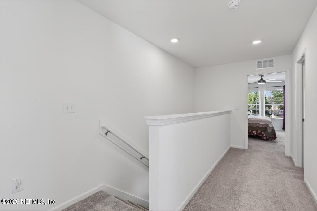 45124 Red Brick Drive Callahan, FL 32011 - Photo 24 of 54 a view of hallway with livingroom and furniture