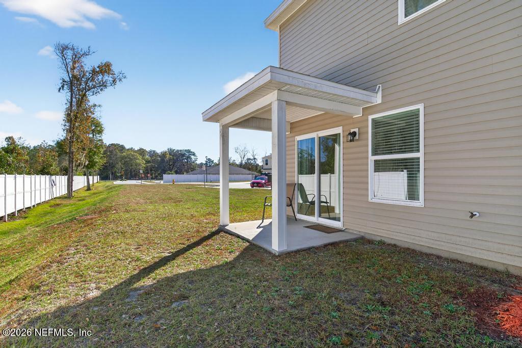 45124 Red Brick Drive Callahan, FL 32011 - Photo 47 of 54 a view of a house with a backyard