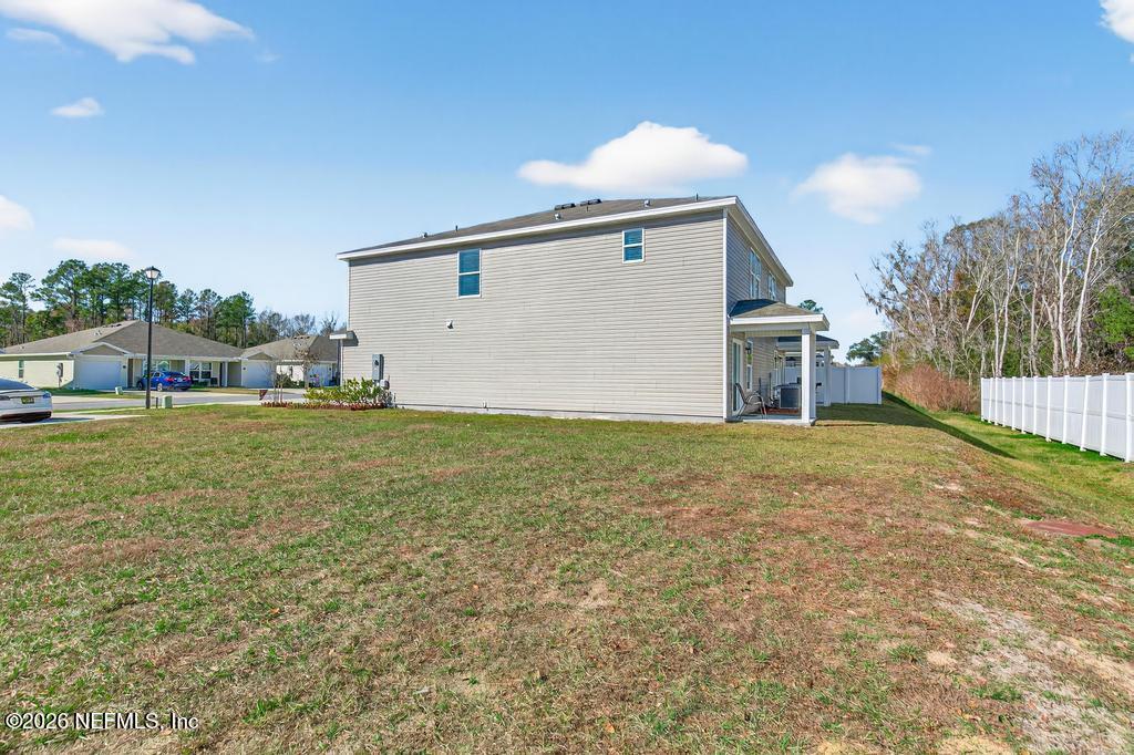 45124 Red Brick Drive Callahan, FL 32011 - Photo 48 of 54 a view of a house with backyard