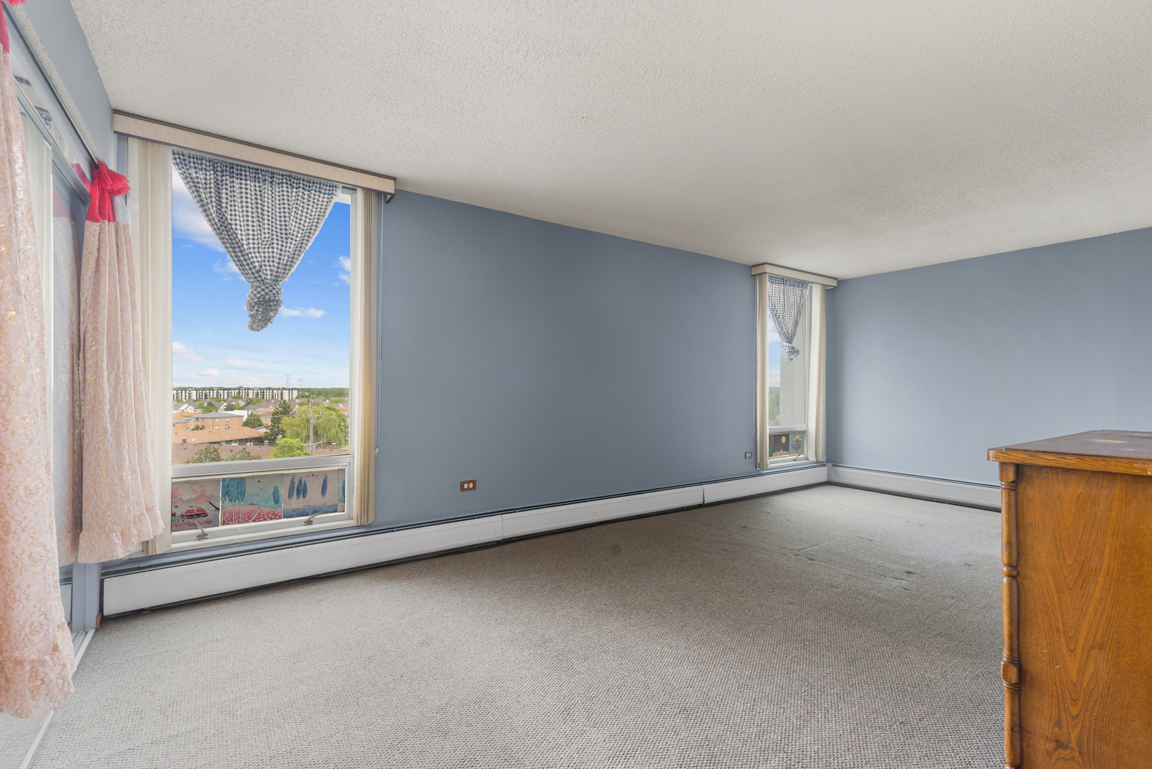 8815 West Golf Road, Unit 7A Niles, IL 60714 - Photo 18 of 26 a view of an empty room with a window