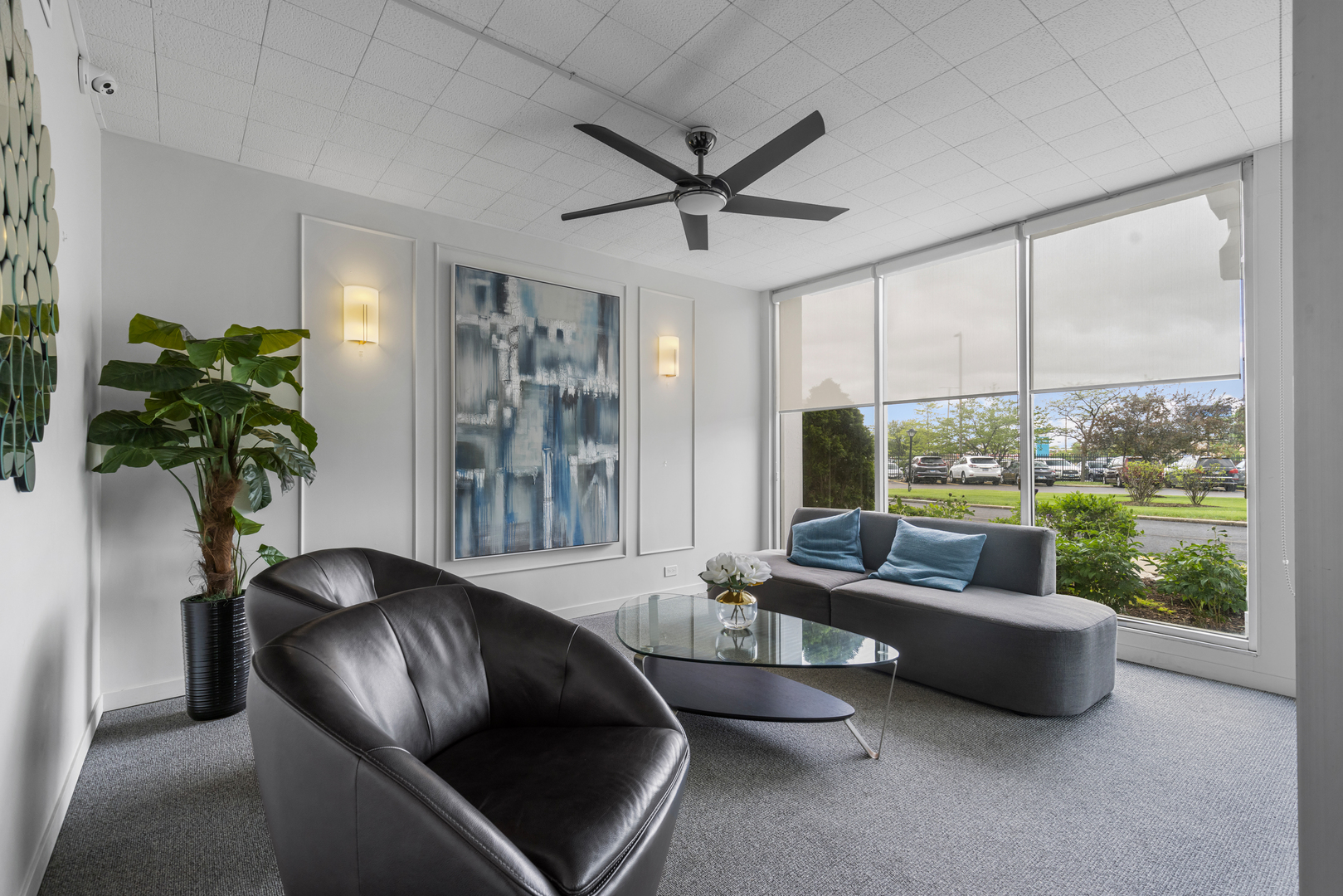 8815 West Golf Road, Unit 7A Niles, IL 60714 - Photo 4 of 26 a living room with furniture and a large window
