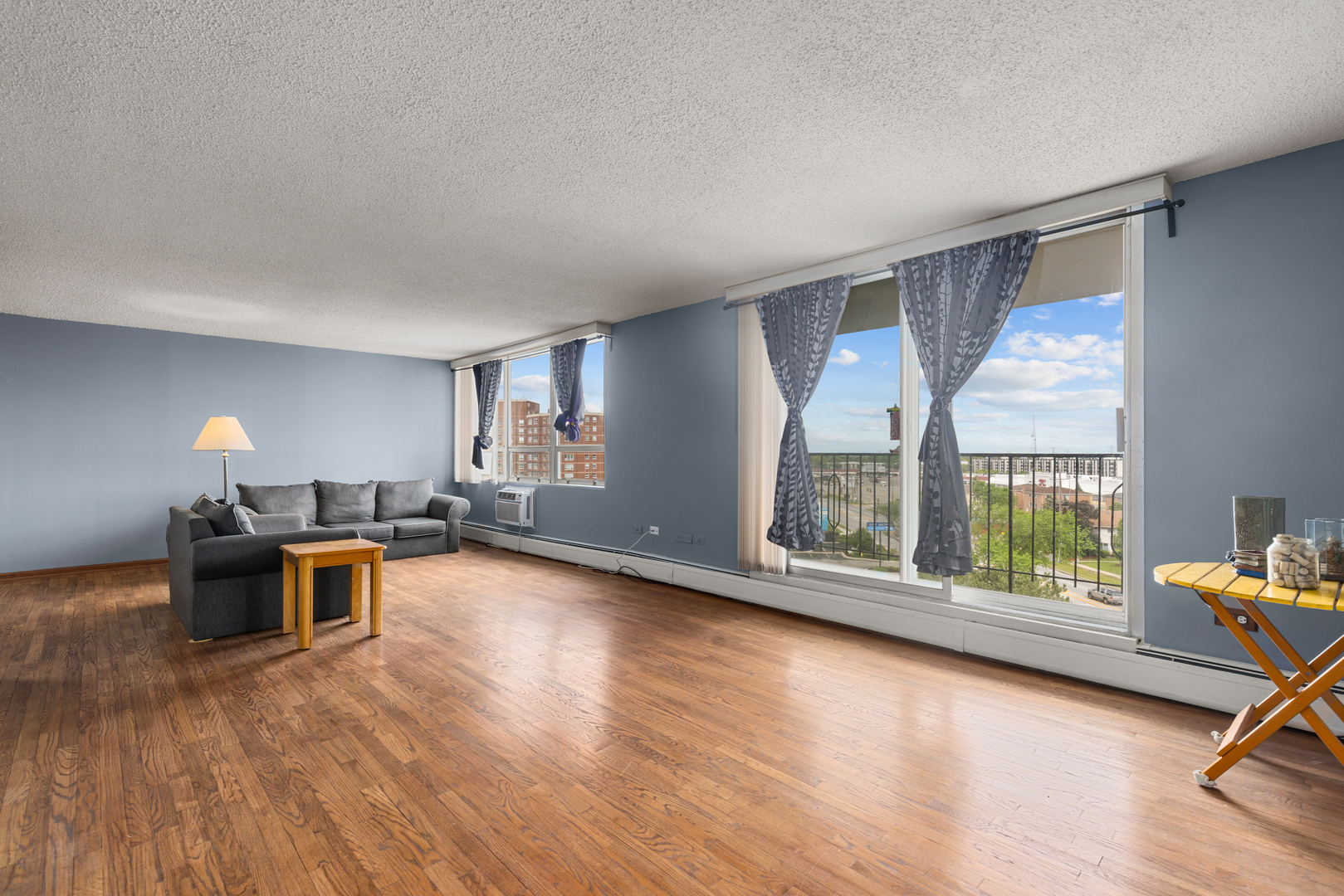 8815 West Golf Road, Unit 7A Niles, IL 60714 - Photo 6 of 26 a view of a work space with wooden floor and a window