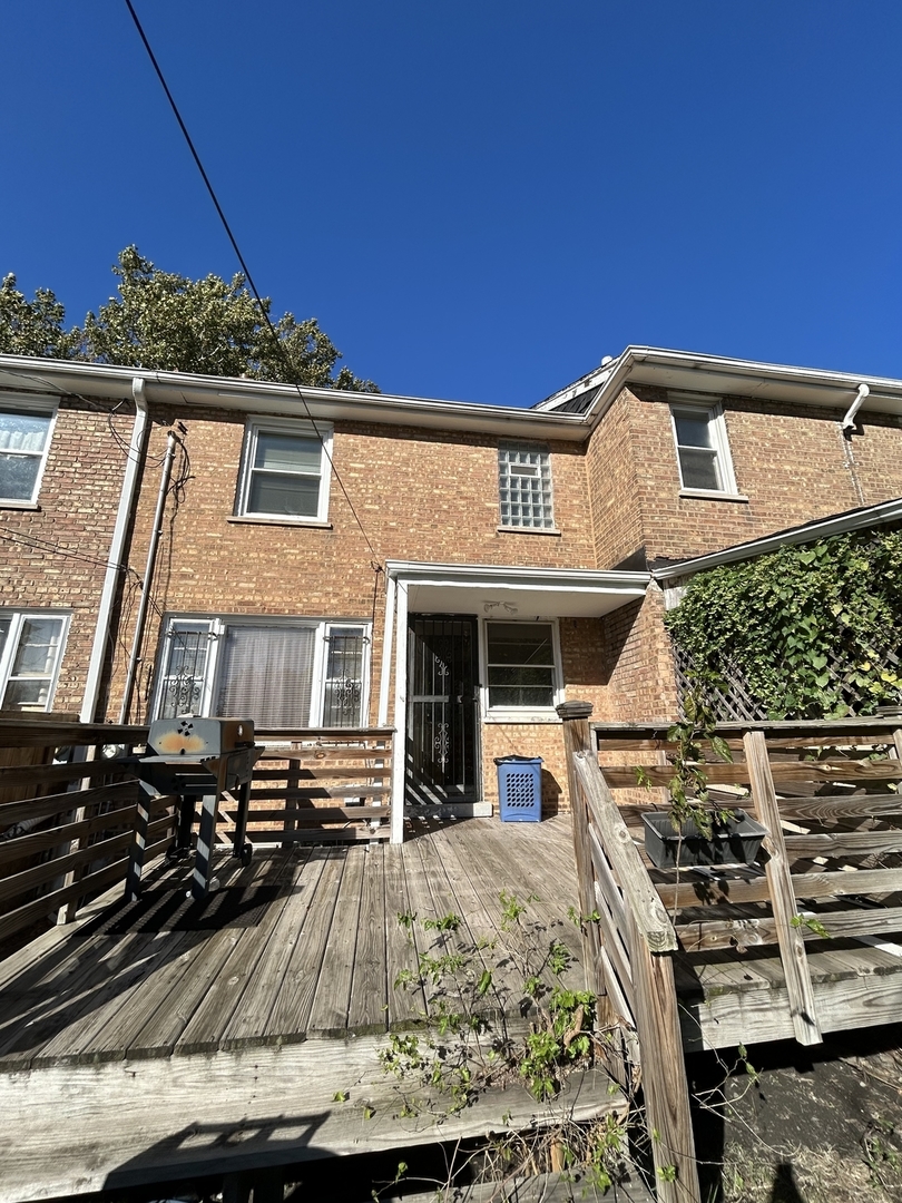 519 East 109th Street Chicago, IL 60628 - Photo 8 of 8 a front view of a house with balcony