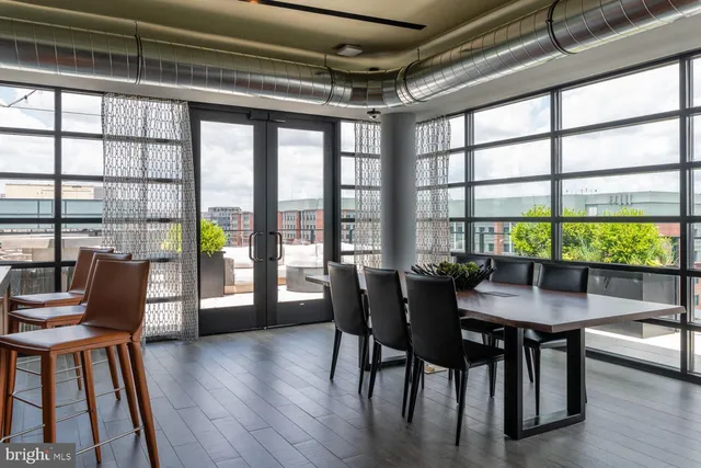 a view of a terrace with furniture and garden view