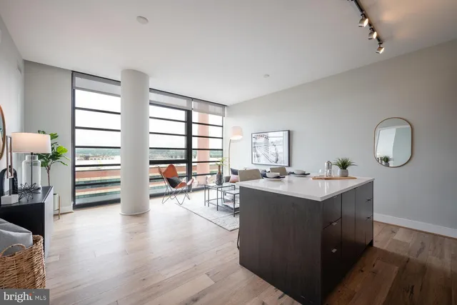 a view of a living room and dining room
