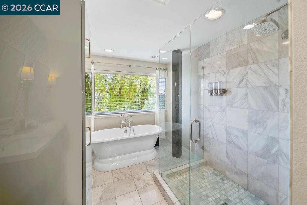 172 Rudgear Drive Walnut Creek, CA 94596 - Photo 32 of 51 a bathroom with a tub a toilet and a shower