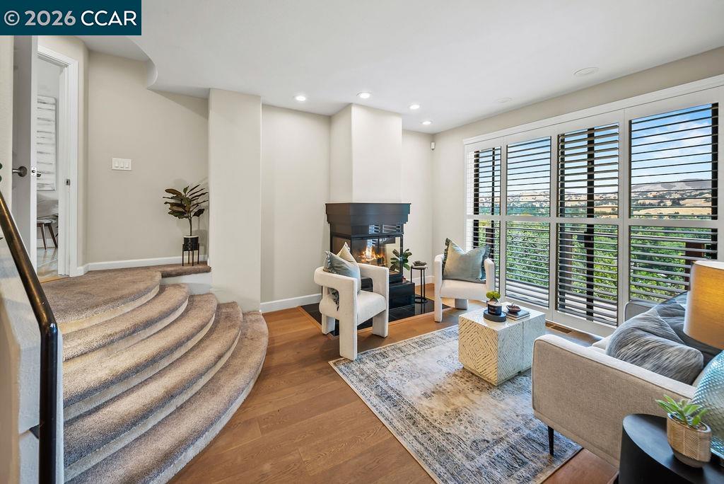 172 Rudgear Drive Walnut Creek, CA 94596 - Photo 33 of 51 a living room with furniture and a large window