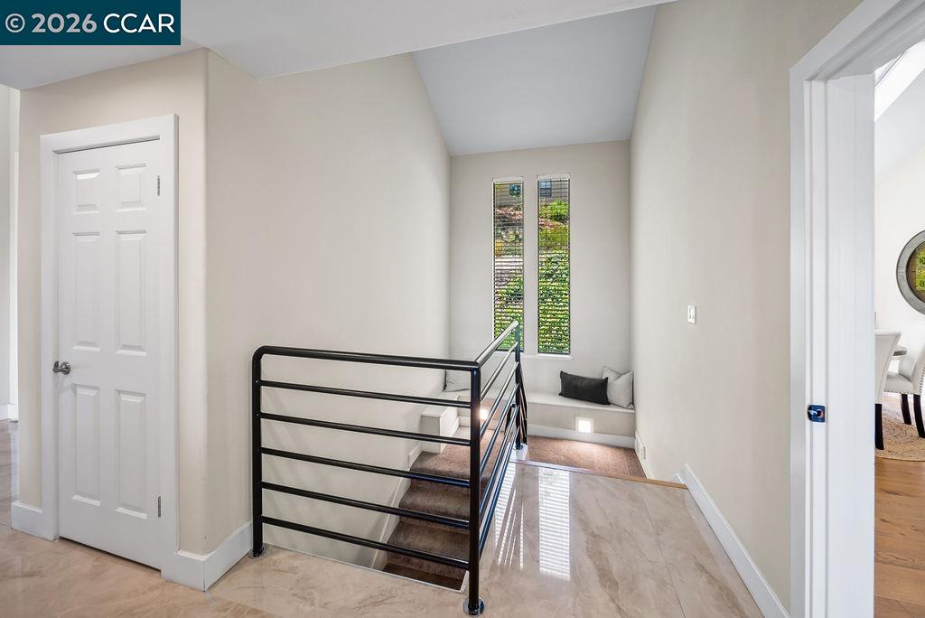 172 Rudgear Drive Walnut Creek, CA 94596 - Photo 34 of 51 a view of a hallway with wooden floor and staircase