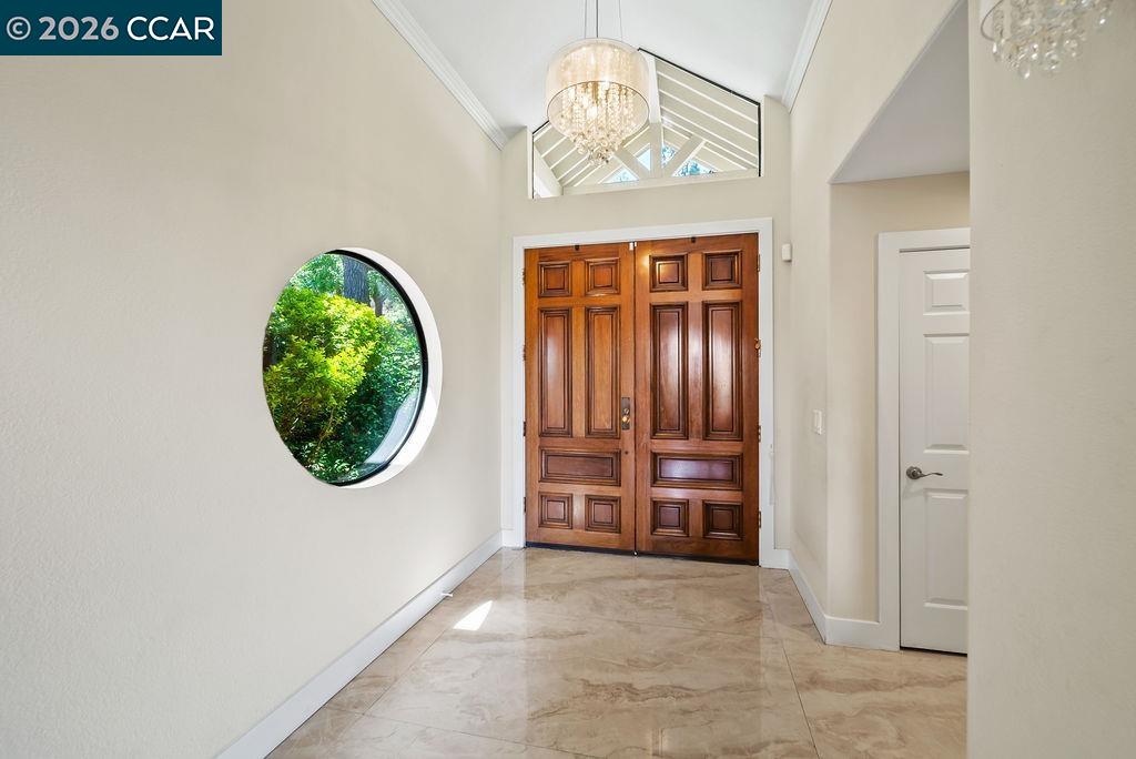 172 Rudgear Drive Walnut Creek, CA 94596 - Photo 5 of 51 an empty room with a window and a mirror