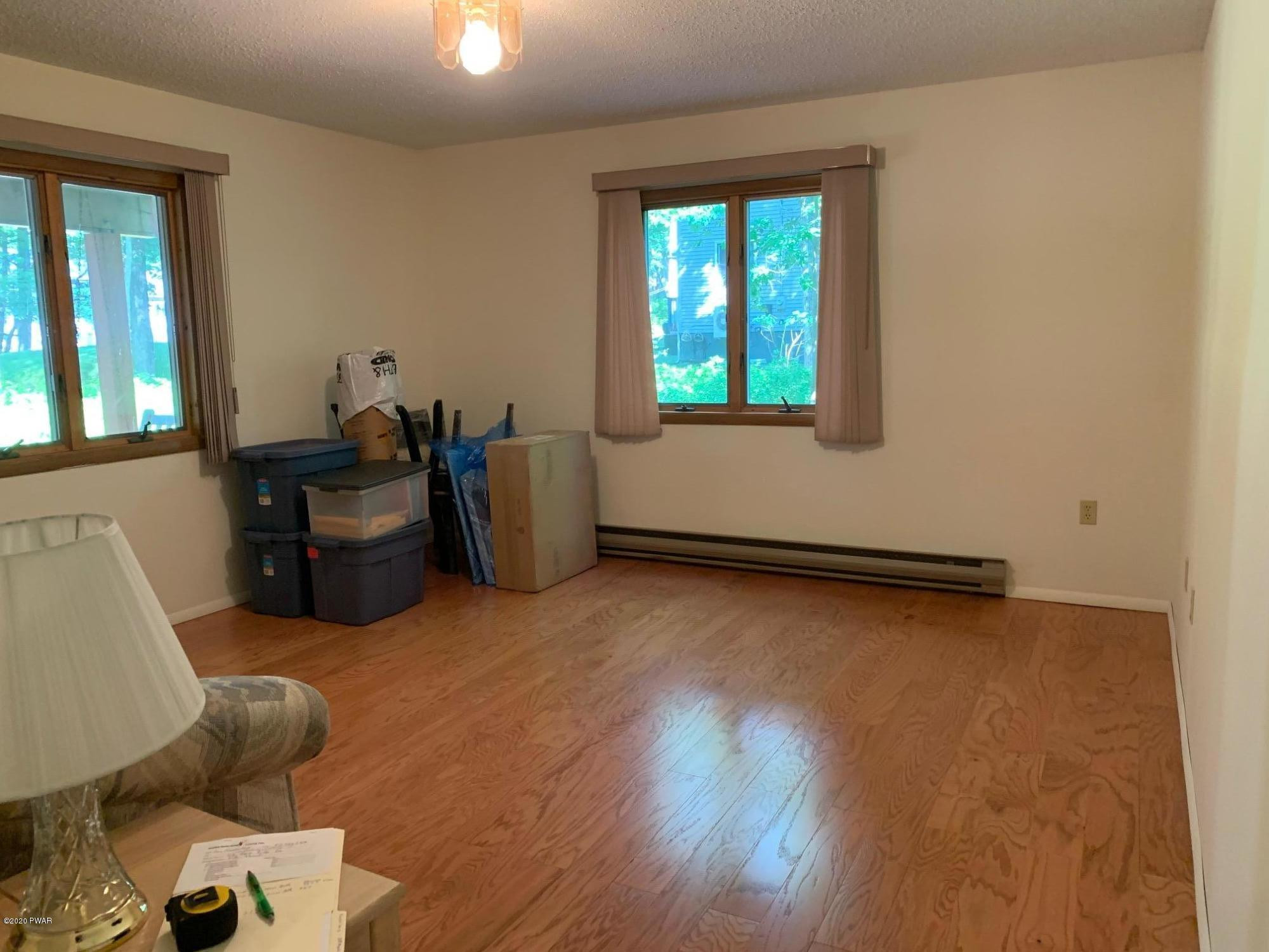 218 Maple Ridge Drive Hawley, PA 18428 - Photo 29 of 46 Playroom windows