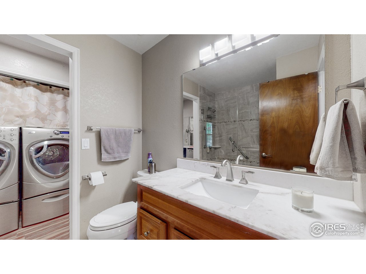 4760 9th St Road Greeley, CO 80634 - Photo 18 of 37 Bathroom that connects to laundry and main bedroom