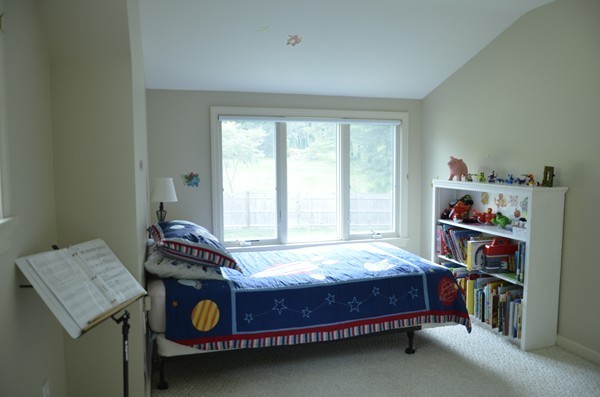 3 West Whitehall Road Amesbury, MA 01913 - Photo 17 of 18 a bedroom with a bed and a window