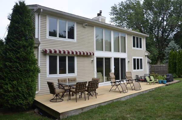 3 West Whitehall Road Amesbury, MA 01913 - Photo 2 of 18 a view of a house with patio and a yard