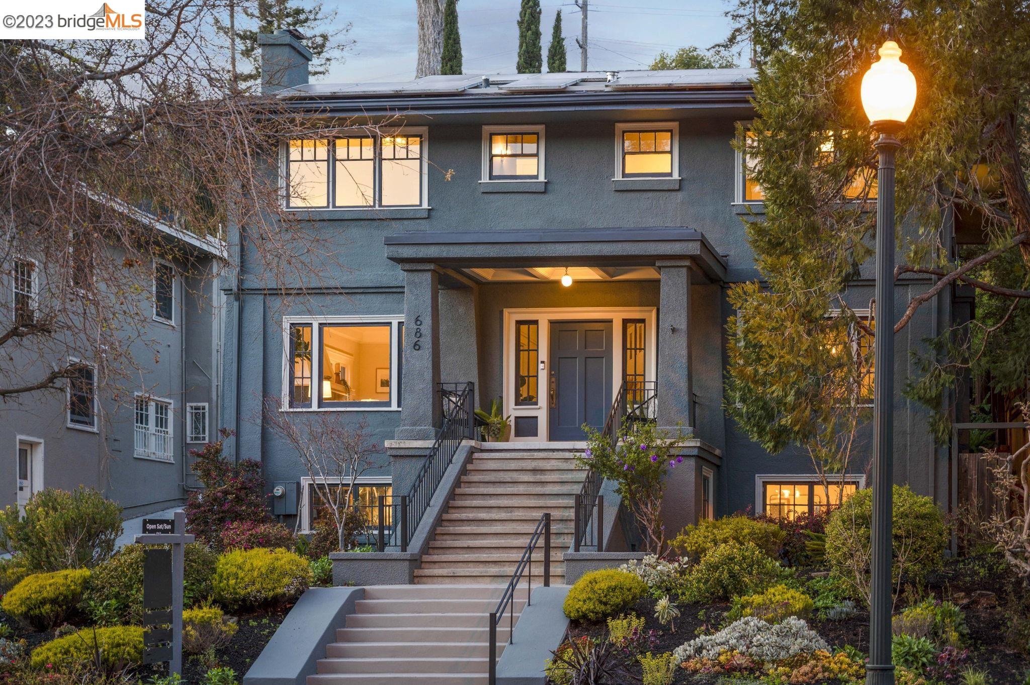 686 Mandana Boulevard Oakland, CA 94610 - Photo 1 of 1 a view of a house with brick walls and floor to ceiling windows