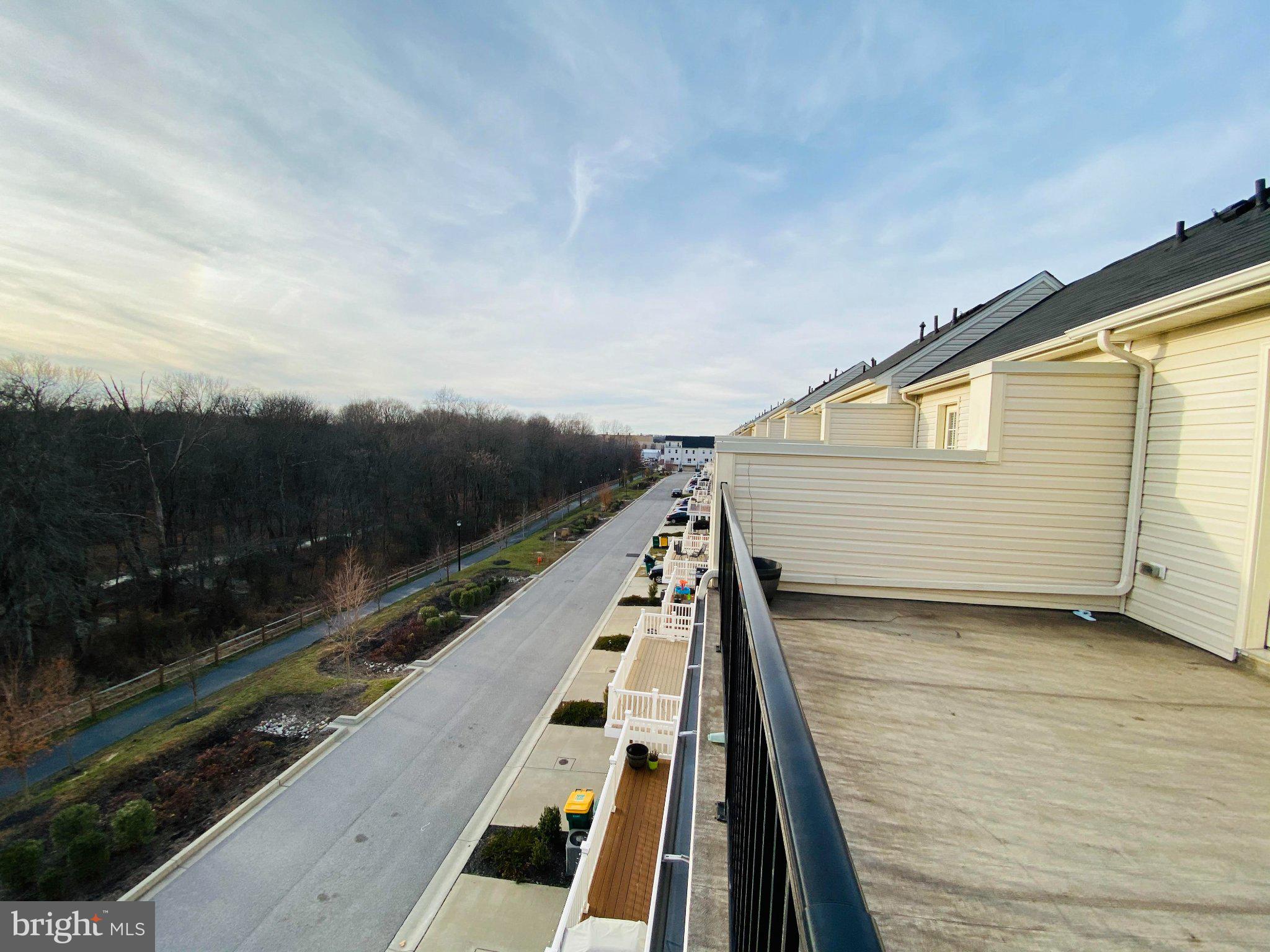 7014 Foxton Way Hanover, MD 21076 - Photo 19 of 29 Scenic views from a modern balcony.
