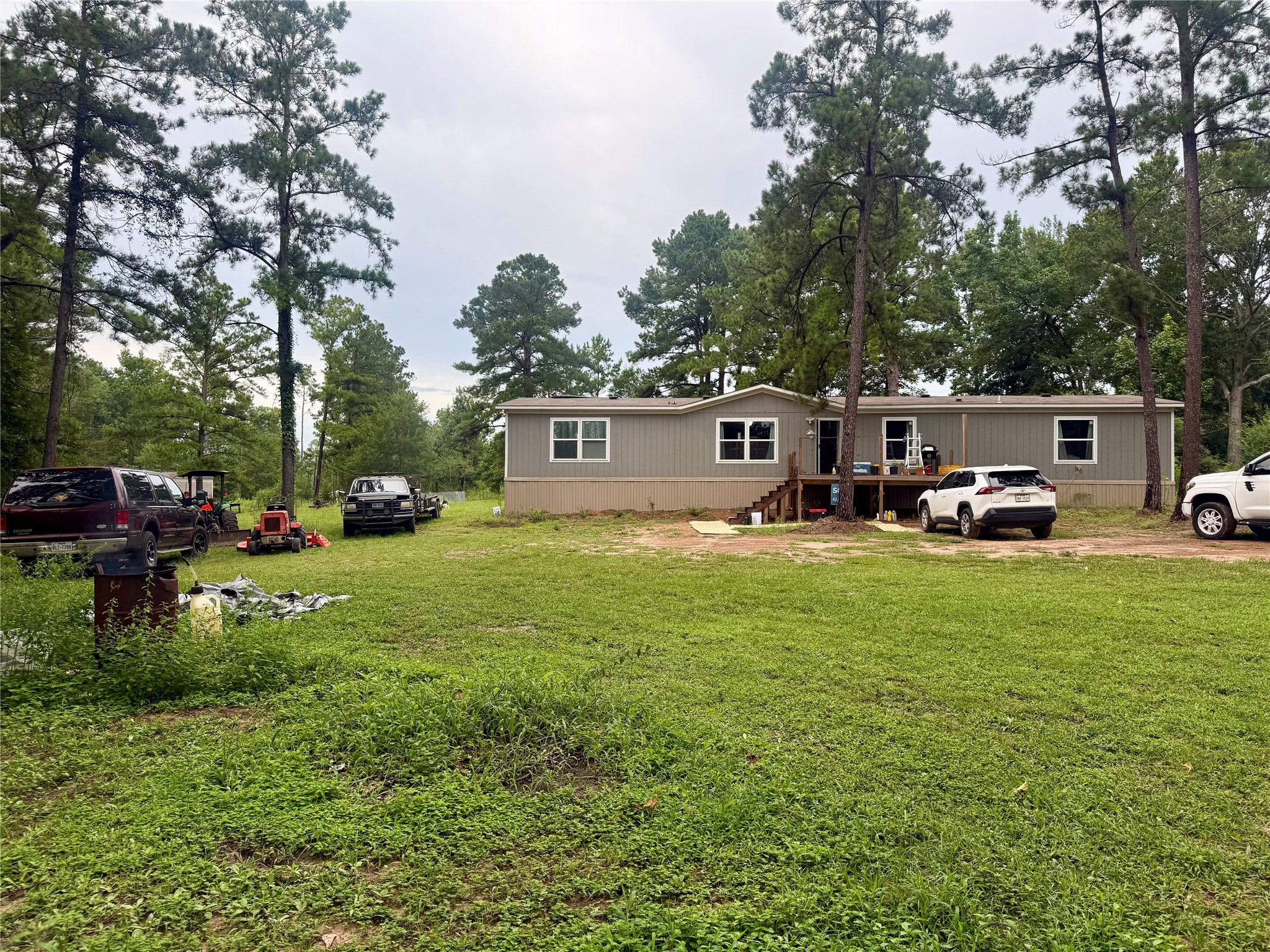 17008 FM 1484 Road Conroe, TX 77303 - Photo 2 of 36 a car parked in front of a house